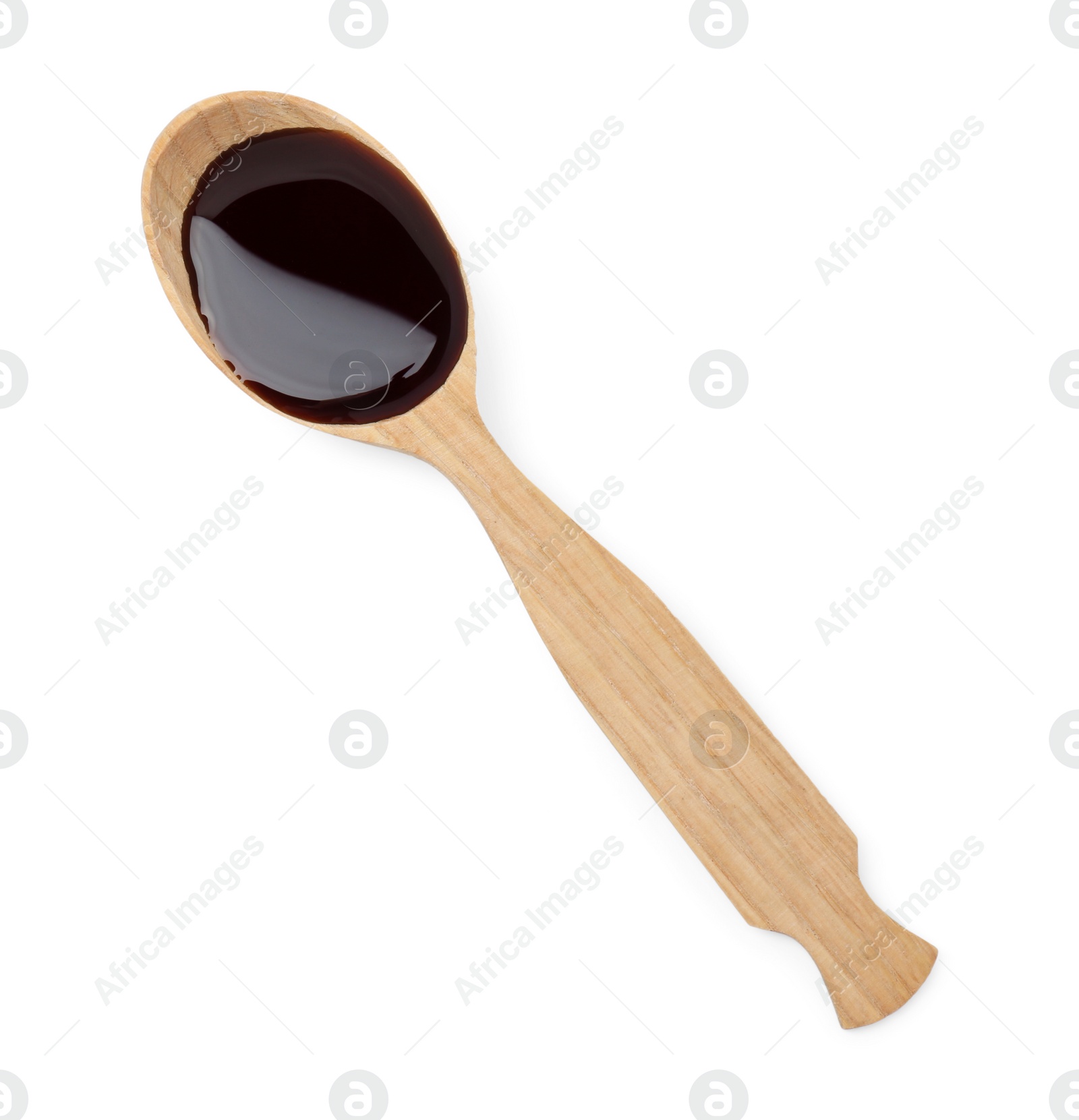 Photo of Tasty soy sauce in spoon isolated on white, top view