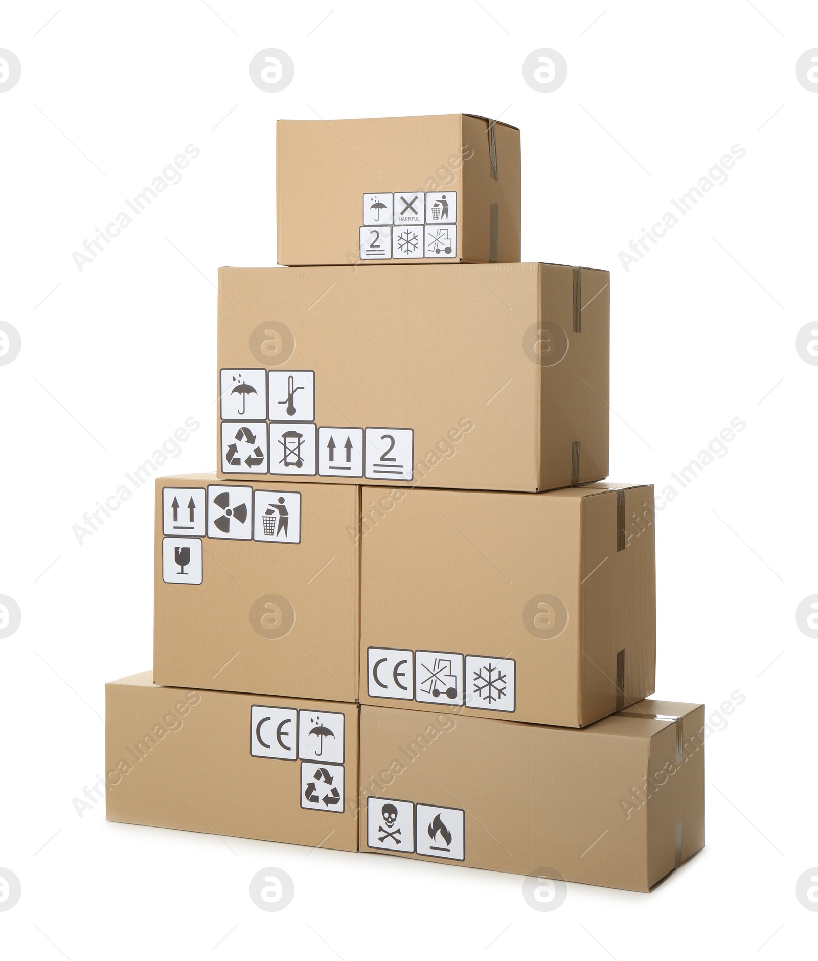 Photo of Stack of cardboard boxes with different packaging symbols on white background. Parcel delivery