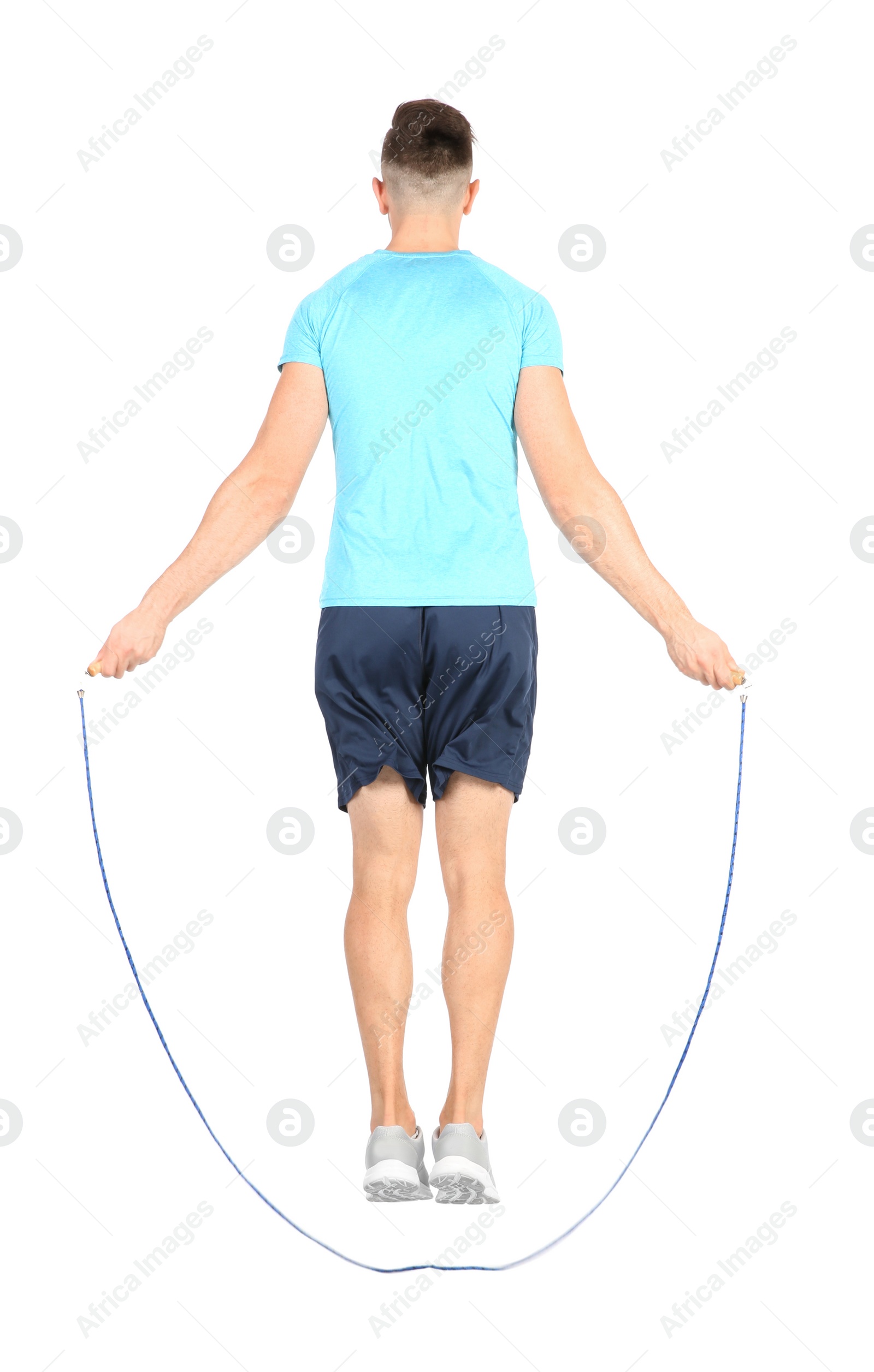 Photo of Sportive man training with jump rope on white background