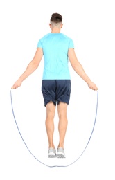 Photo of Sportive man training with jump rope on white background