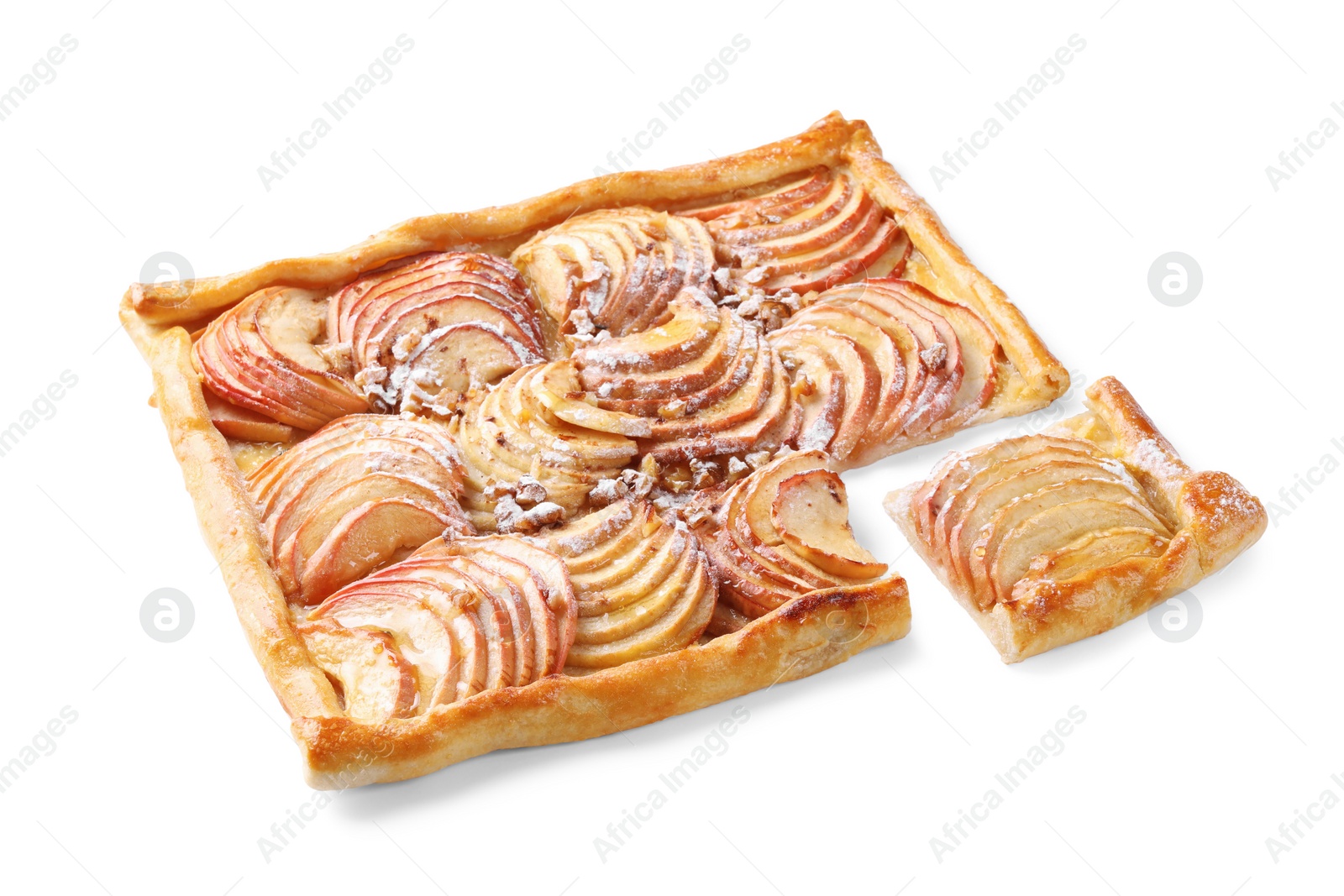 Photo of Freshly baked apple pie with nuts and powdered sugar isolated on white