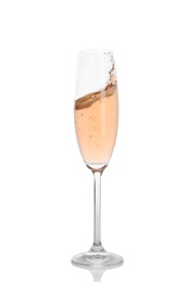 Photo of Glass of rose champagne on white background