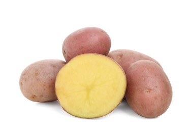 Photo of Whole and cut fresh potatoes on white background