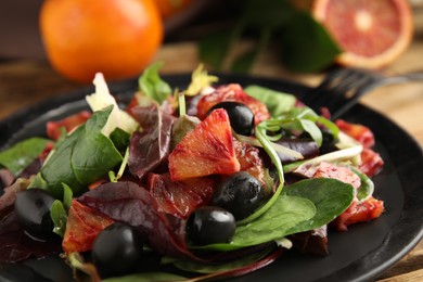 Delicious salad with sicilian orange on plate, closeup