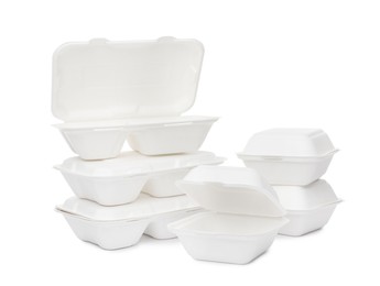 Set of different containers for food on white background