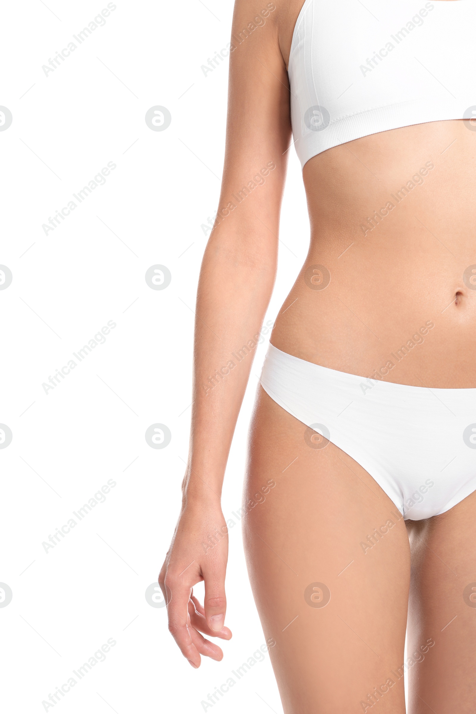 Photo of Slim young woman with smooth gentle skin on white background, closeup. Beauty and body care concept