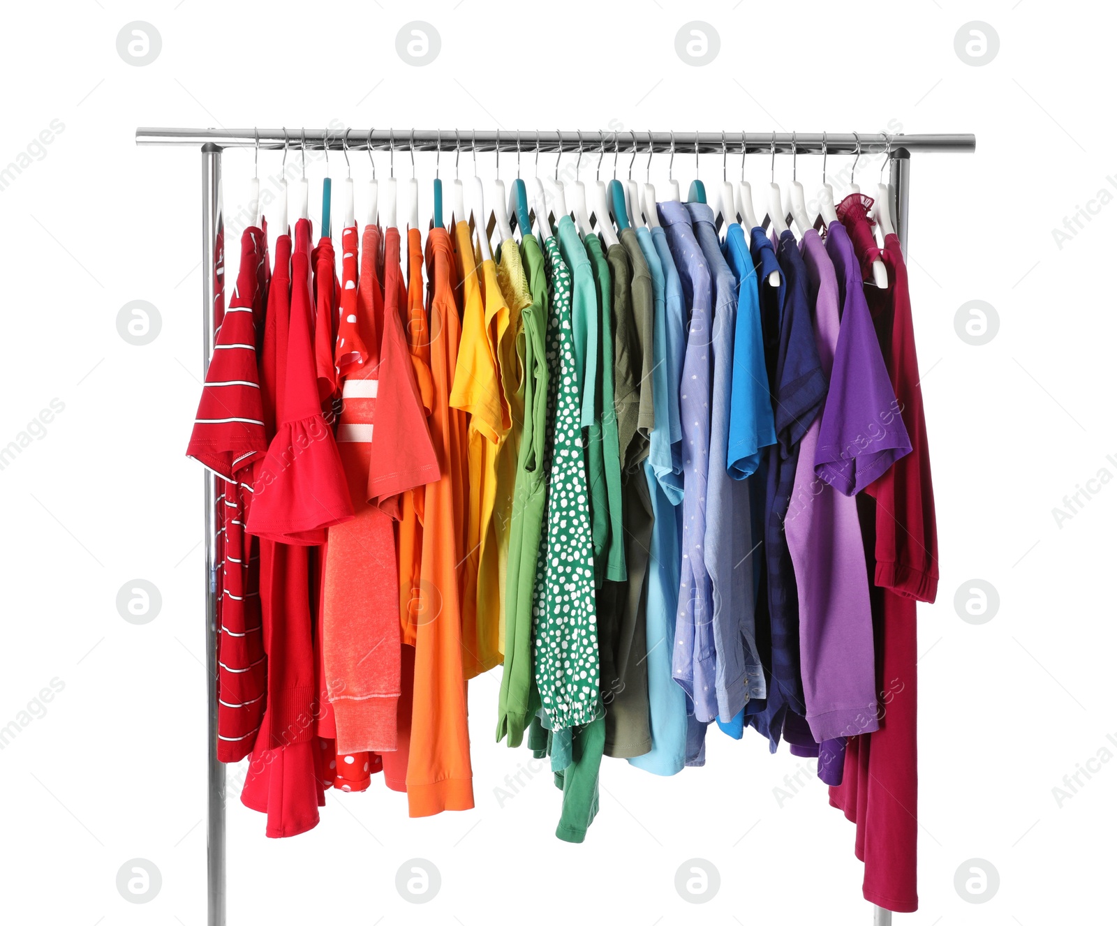 Photo of Wardrobe rack with different colorful clothes on white background