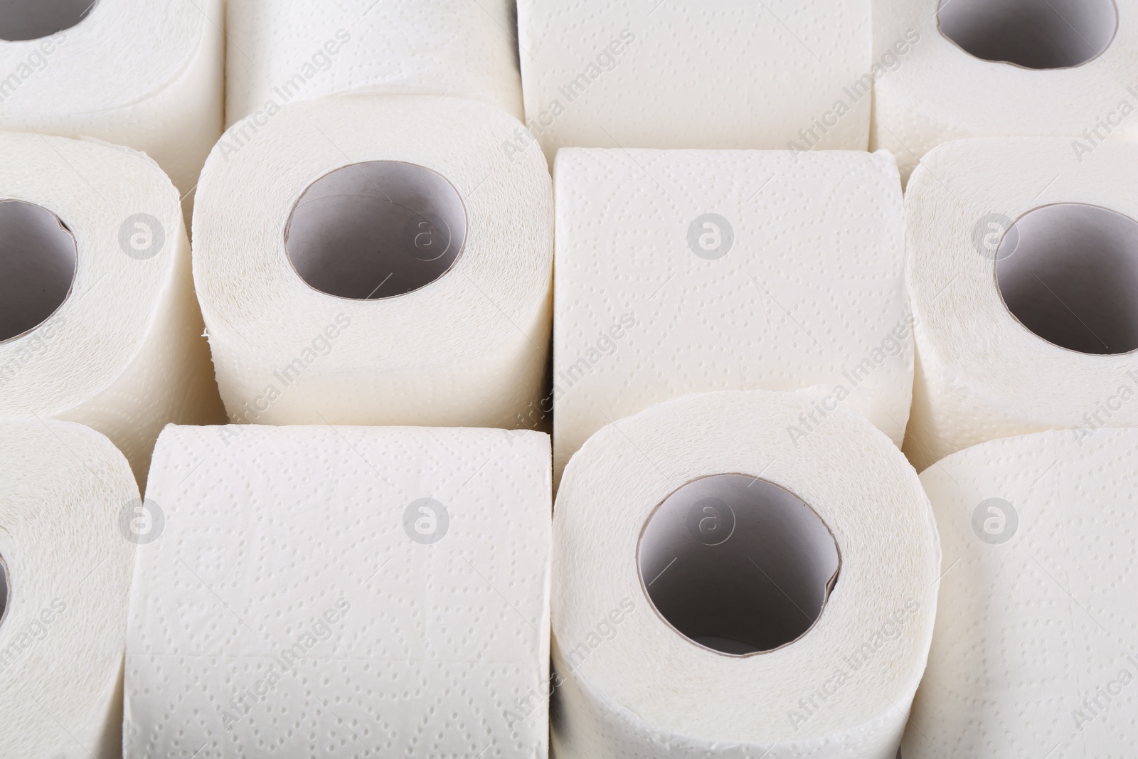 Photo of Many soft toilet paper rolls as background, above view