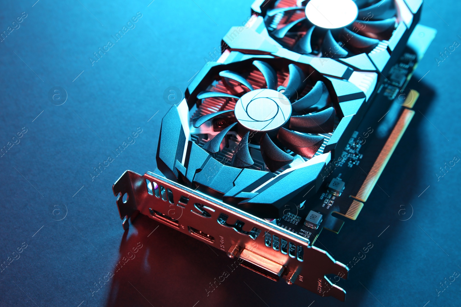 Photo of Computer graphics card on color background, closeup. Space for text