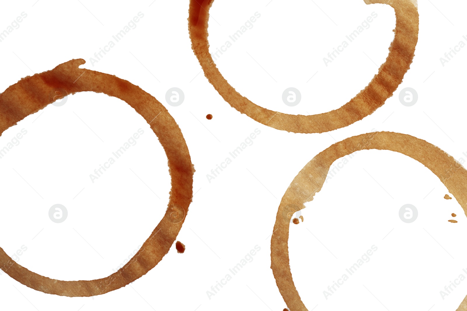 Photo of Coffee cup stains isolated on white, top view