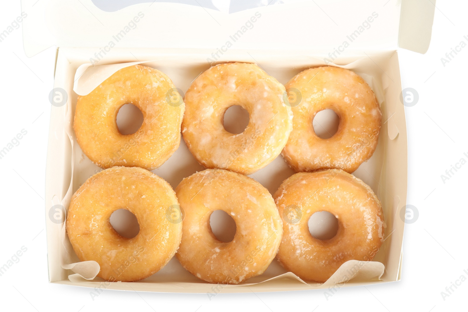 Photo of Delicious donuts in box isolated on white, top view