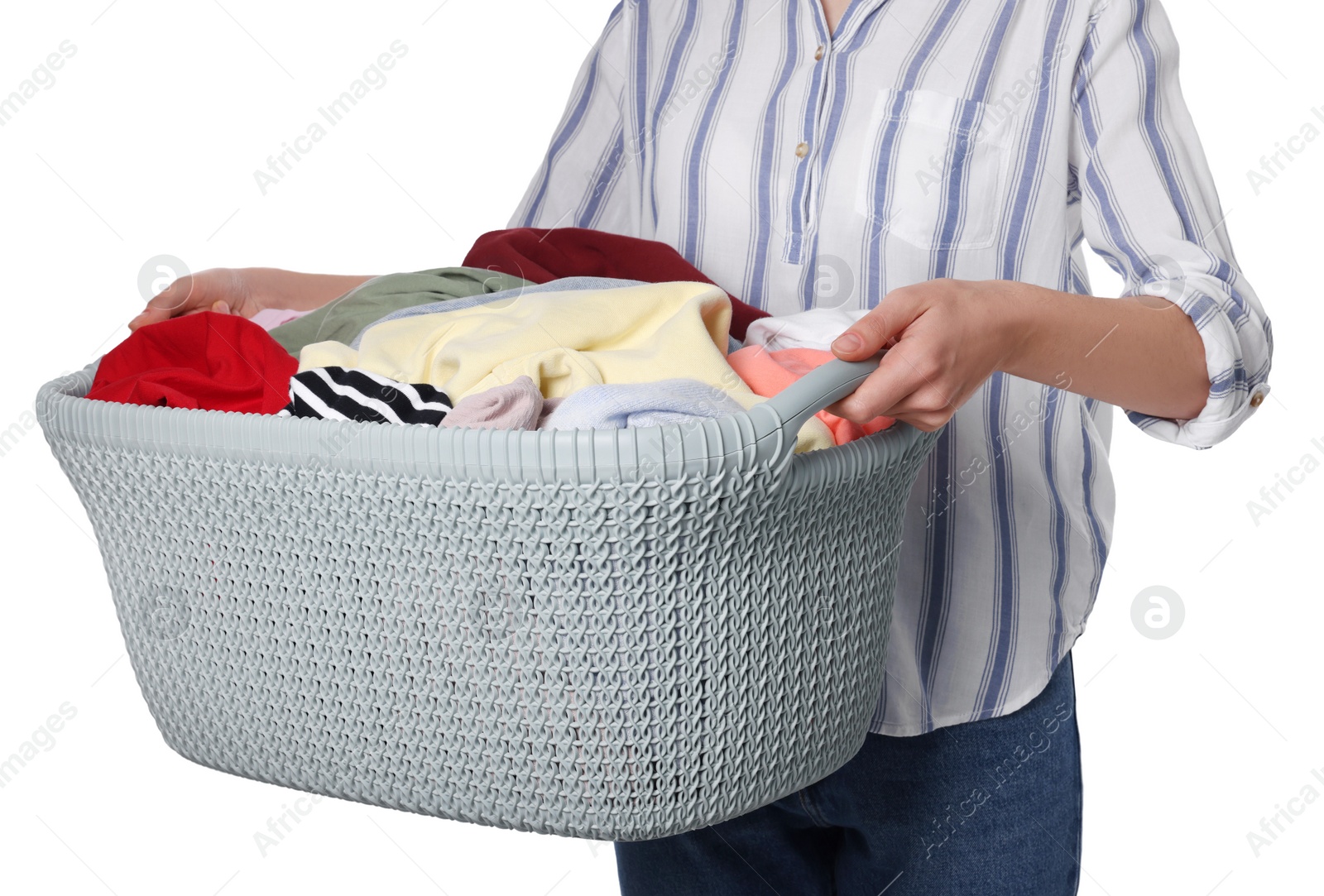 Photo of Woman with basket full of clean laundry on white background, closeup