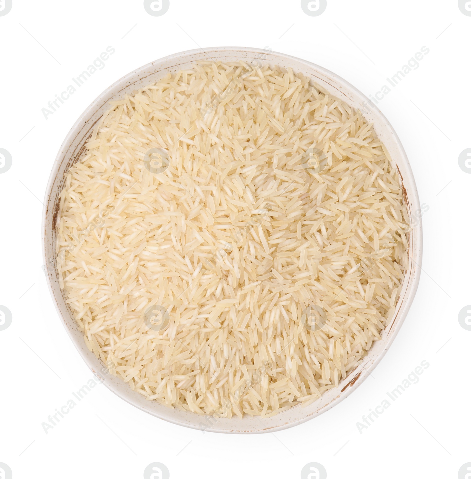 Photo of Raw rice in bowl isolated on white, top view