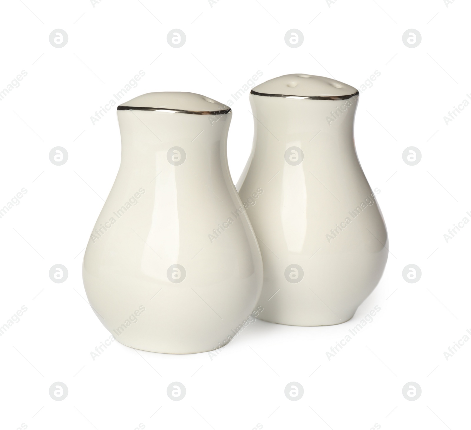 Photo of Ceramic salt and pepper shakers isolated on white