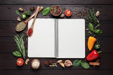 Photo of Open recipe book and different ingredients on wooden table, flat lay. Space for text