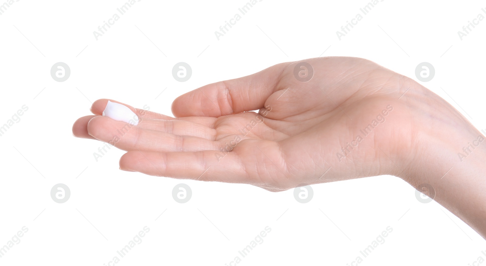 Photo of Young woman applying hand cream against on white background