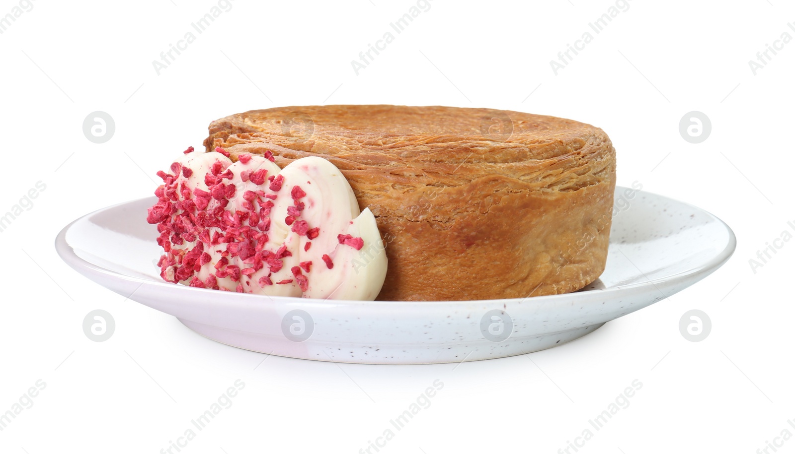 Photo of Round croissant with cream isolated on white. Tasty puff pastry