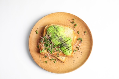 Photo of Plate of tasty toasts with avocado, sprouts and chia seeds on white background, top view