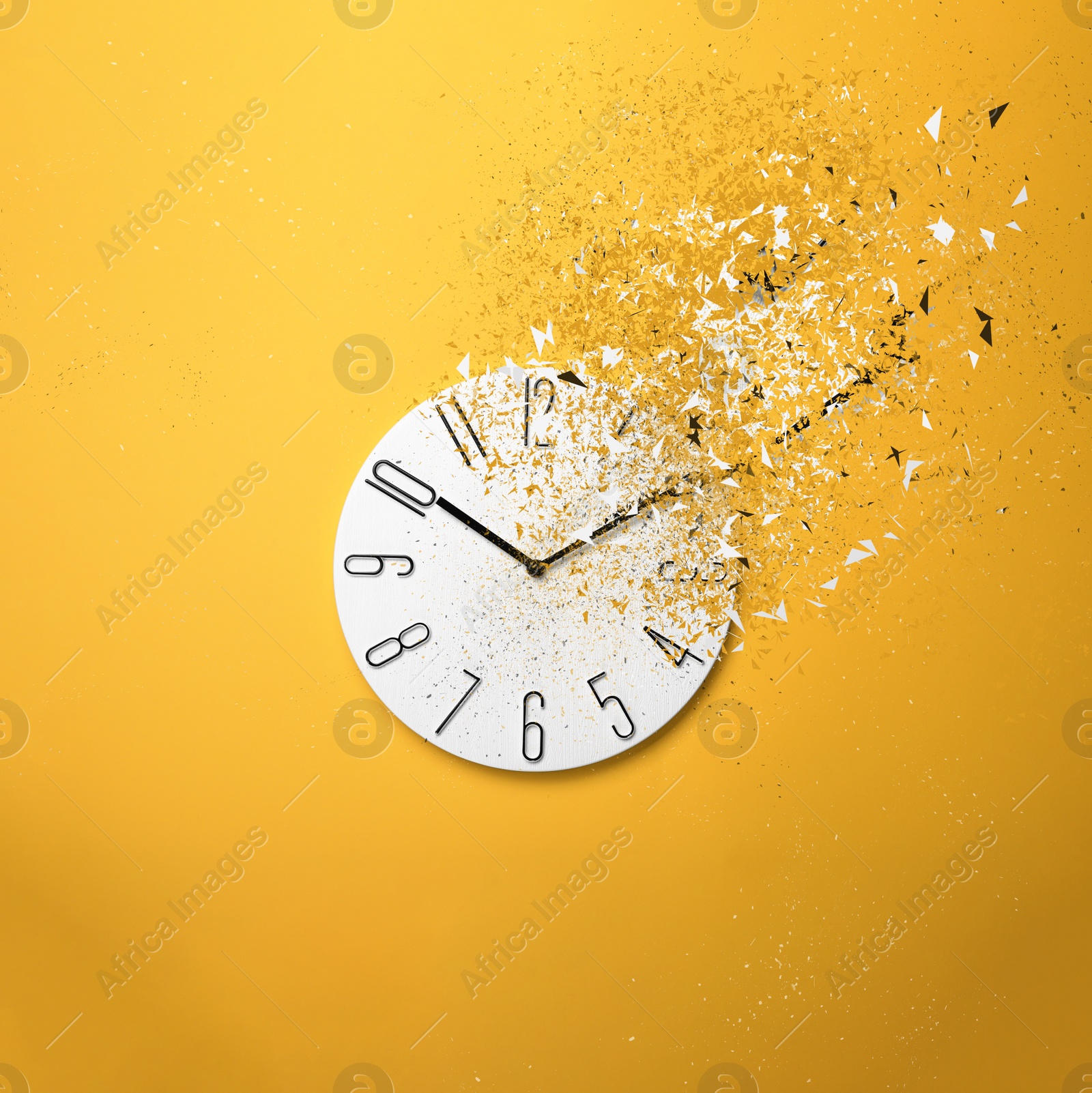 Image of Fleeting time concept. Analog clock dissolving on yellow background