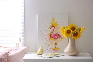 Photo of Beautiful bouquet of sunflowers in vase on white table indoors