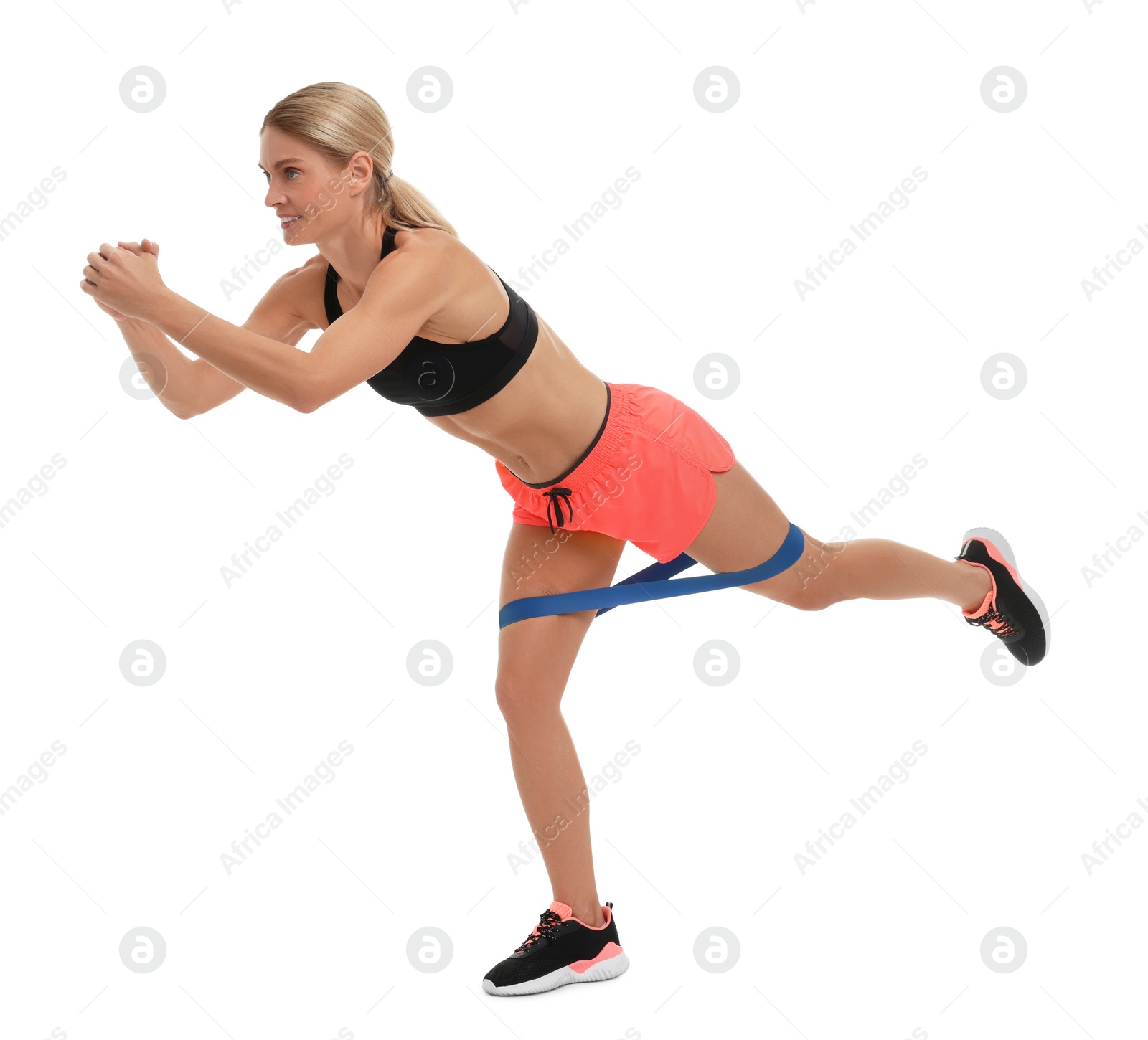 Photo of Woman exercising with elastic resistance band on white background