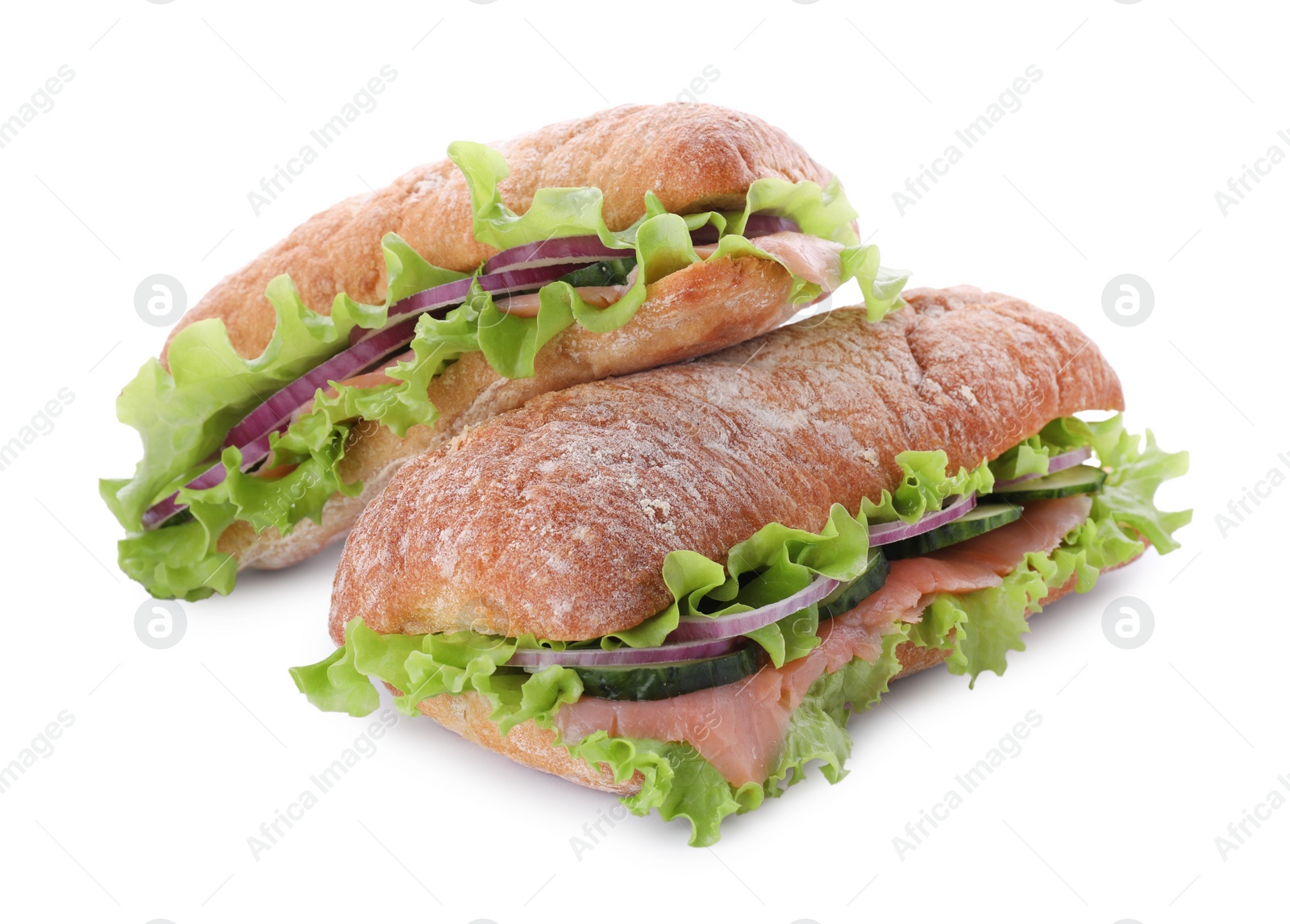 Photo of Delicious sandwiches with fresh vegetables and salmon isolated on white