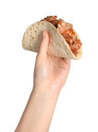 Photo of Woman holding delicious taco with meat on white background, closeup