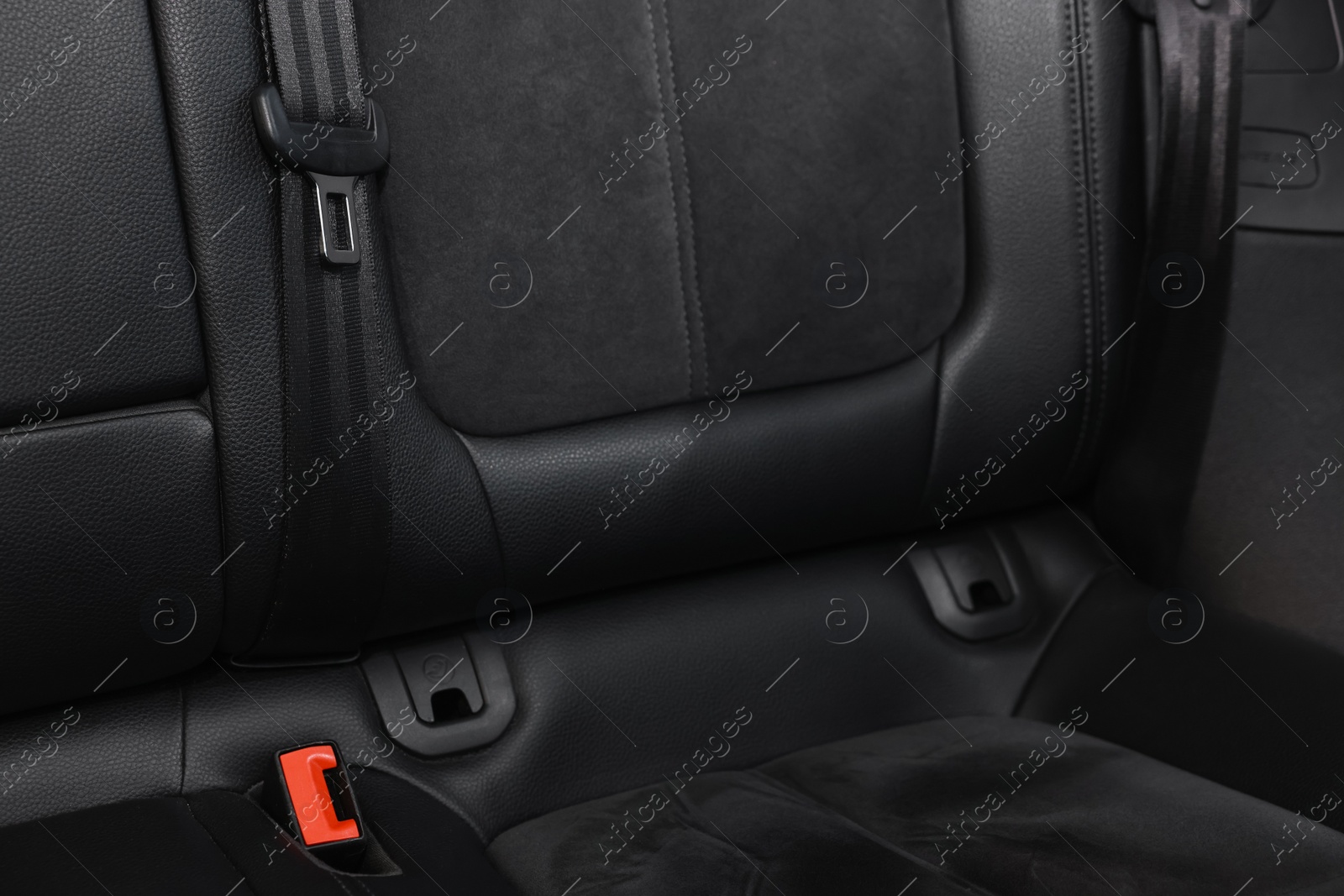 Photo of Clean leather seat inside of modern black car