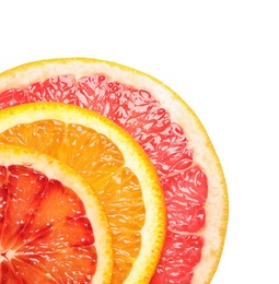 Photo of Slices of fresh citrus fruits on white background, top view