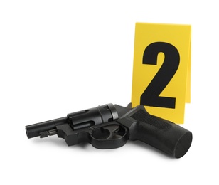 Gun and crime scene marker with number two isolated on white