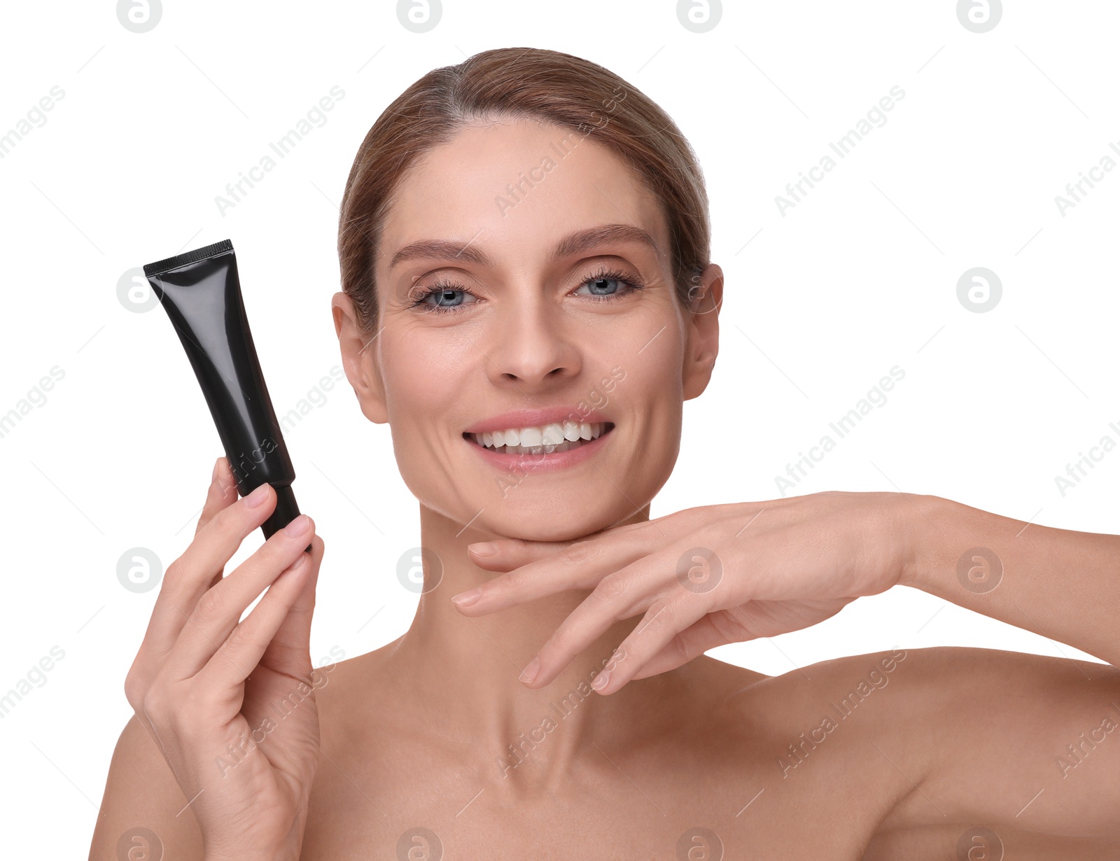 Photo of Woman holding tube with foundation on white background