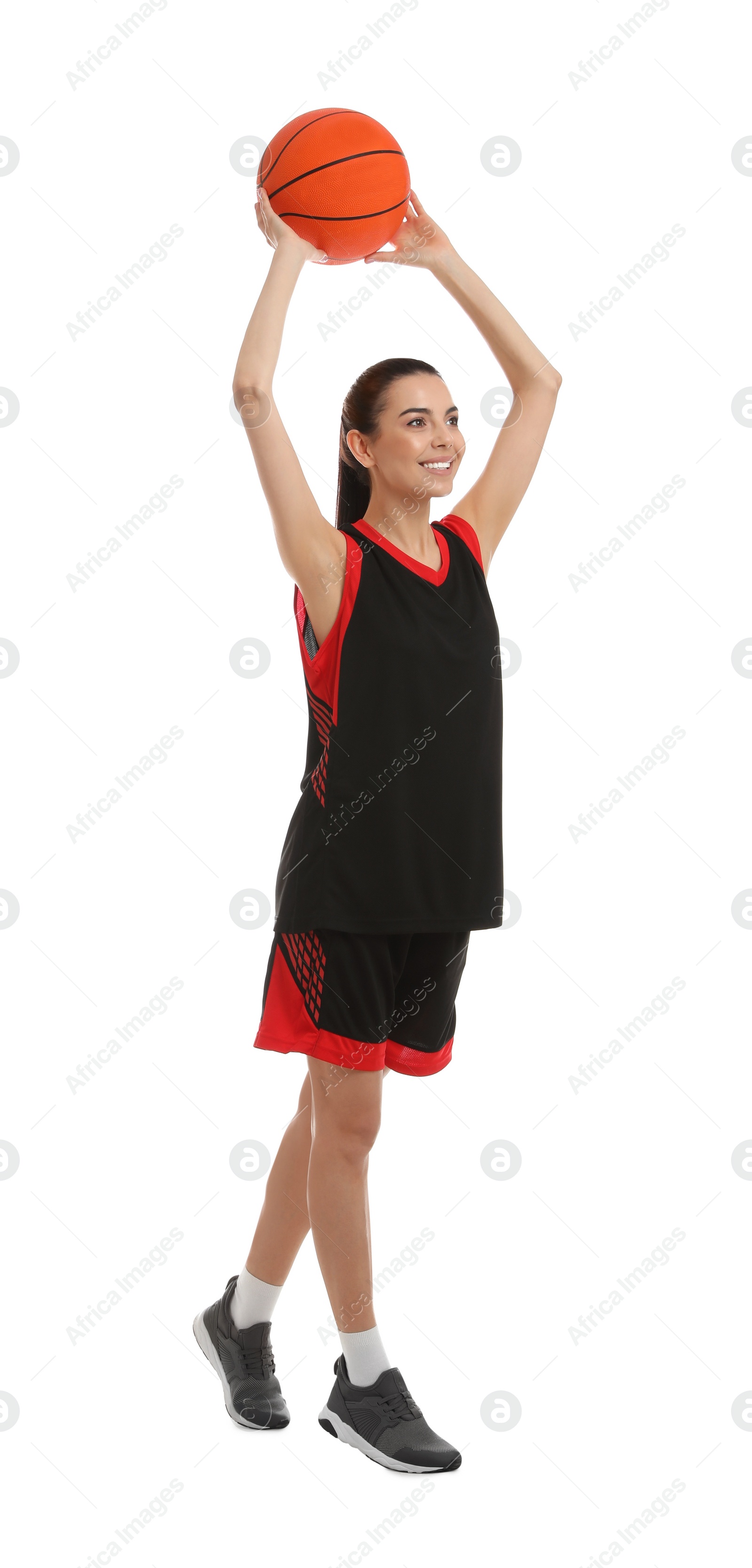 Photo of Professional sportswoman playing basketball on white background