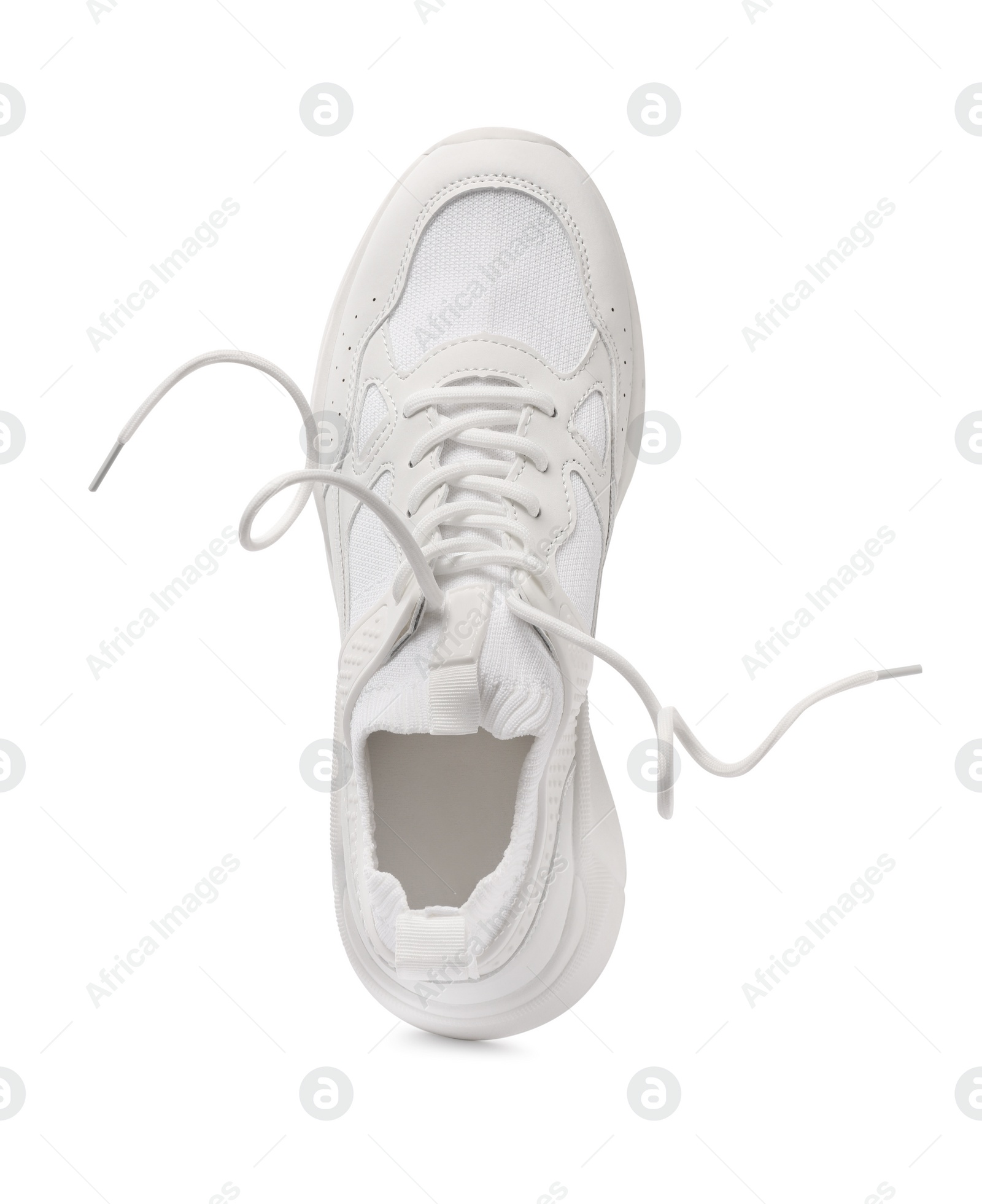 Photo of One stylish new sneaker isolated on white