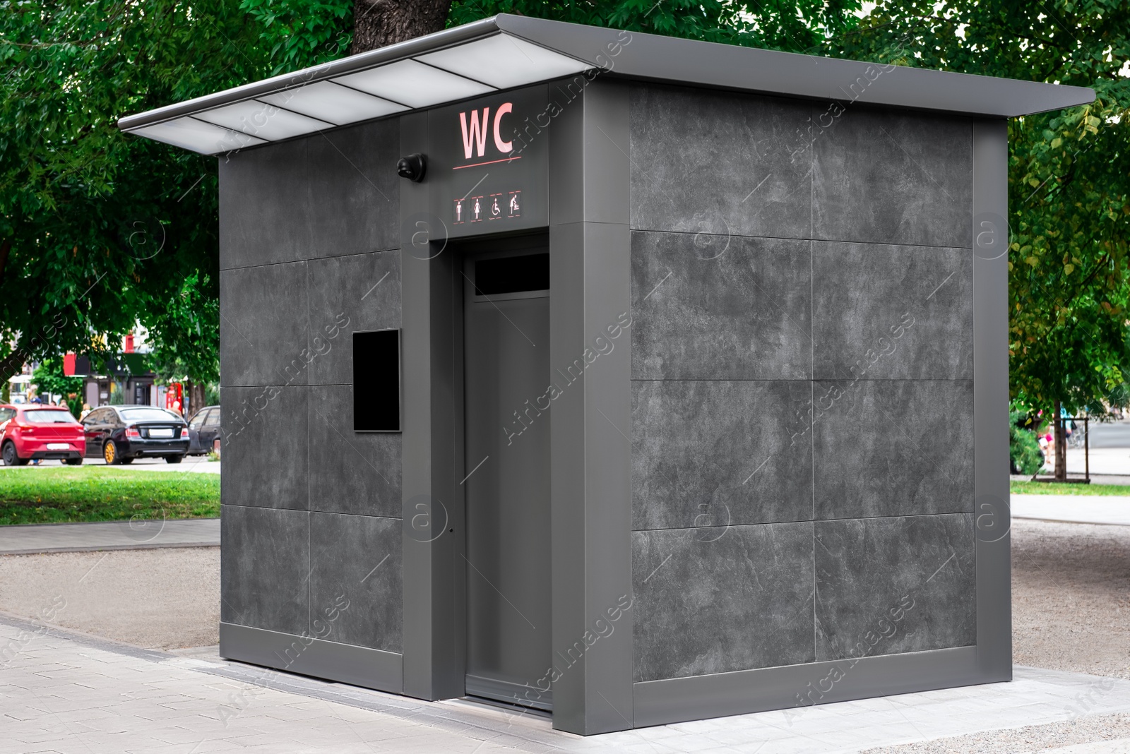 Photo of Modern outdoor public toilet in city park