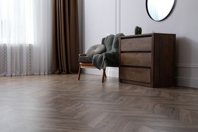 Photo of Modern living room with parquet flooring and stylish furniture