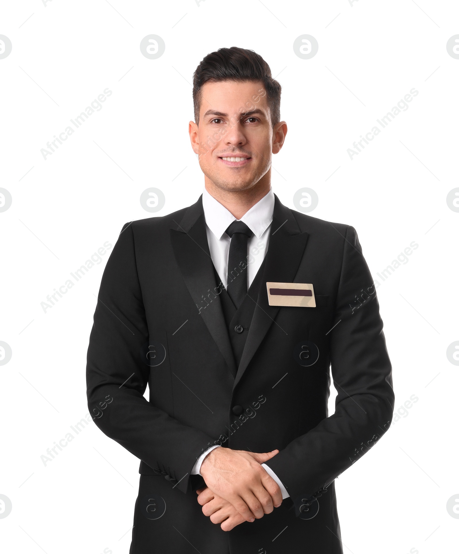 Photo of Portrait of happy receptionist in uniform on white background