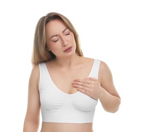 Photo of Mammology. Young woman doing breast self-examination on white background