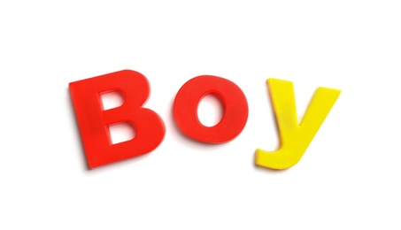 Photo of Word BOY of magnetic letters on white background, top view