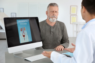 Photo of Man with health problem visiting urologist at hospital