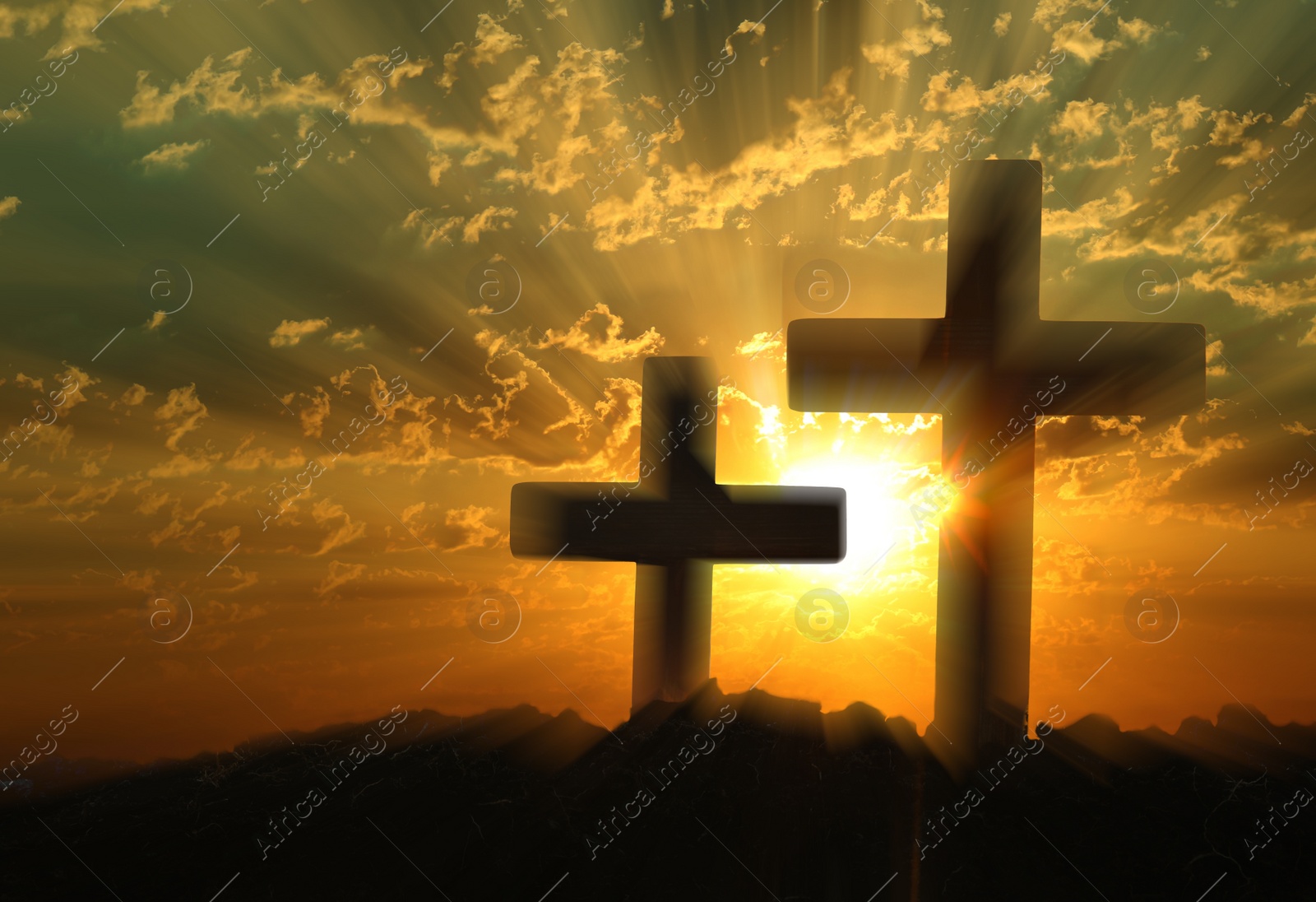 Image of Silhouette of Christian crosses outdoors at sunset