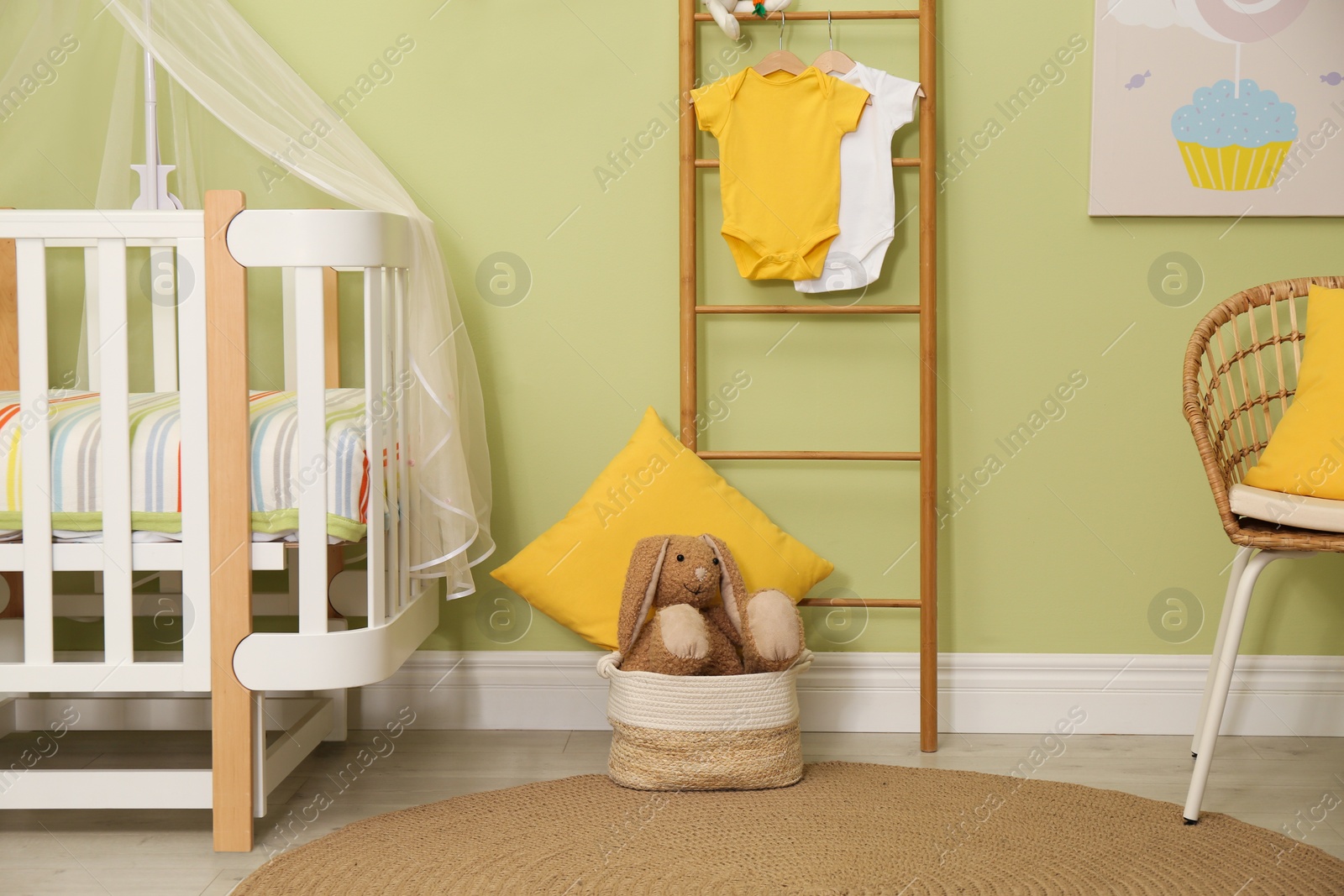 Photo of Baby room interior with stylish furniture and toys