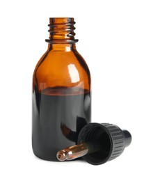 Photo of Bottle of medical iodine and dropper on white background