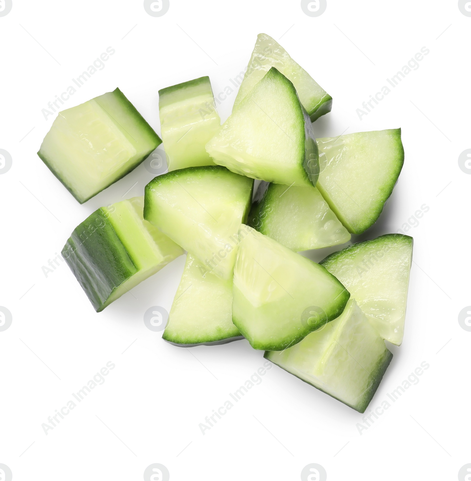 Photo of Pile of fresh cut cucumber isolated on white, top view