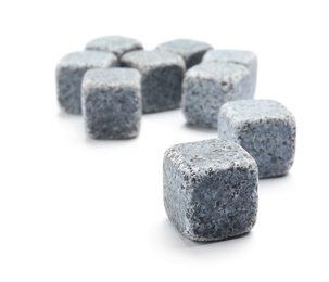 Photo of Classic grey whiskey stones on white background