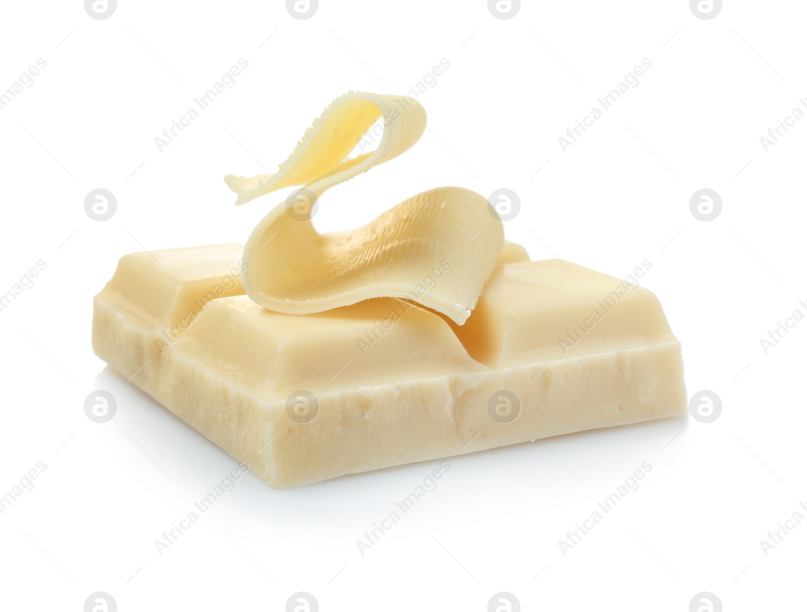 Photo of Yummy chocolate curl and piece on white background
