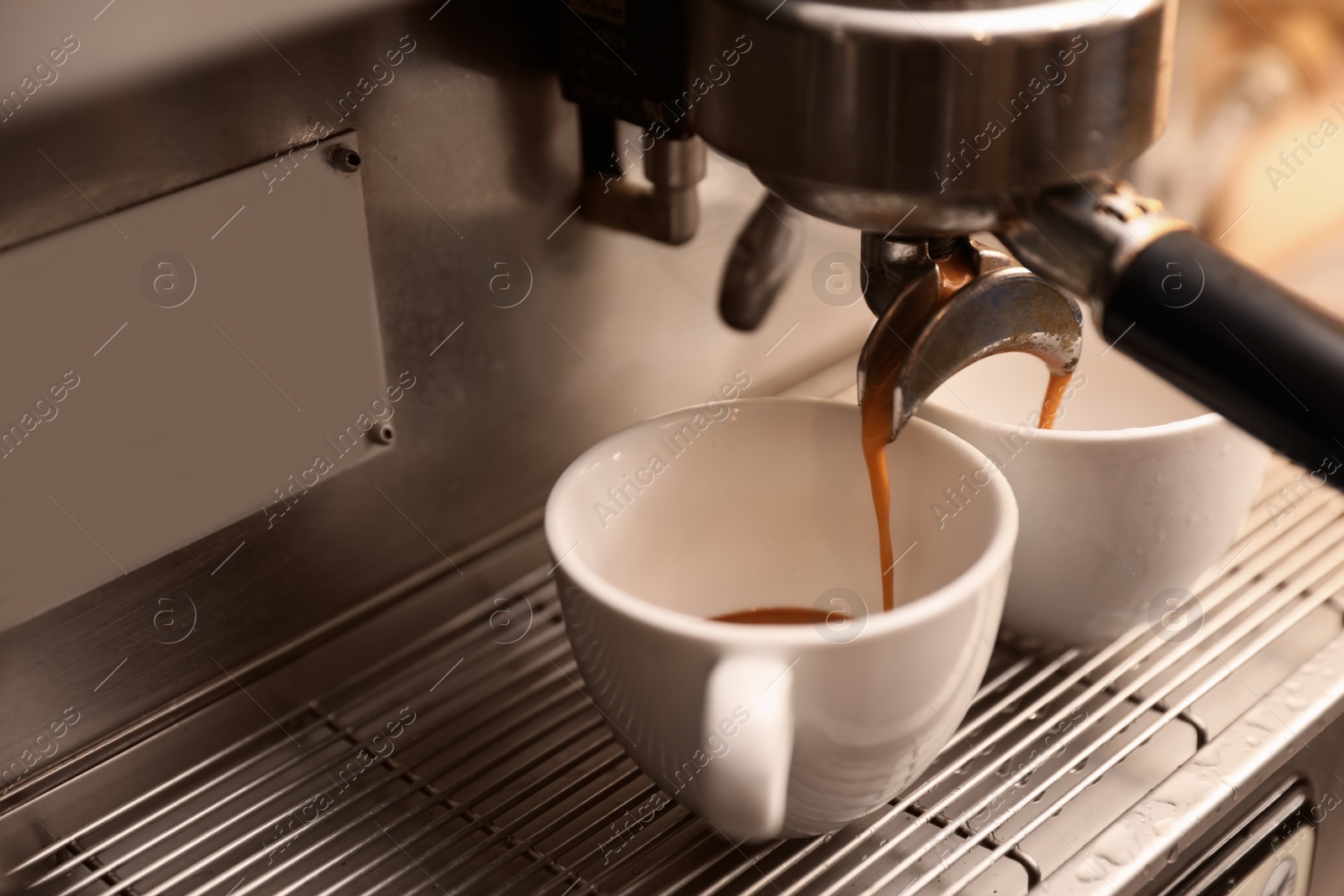 Photo of Preparing fresh aromatic coffee using modern machine, closeup. Space for text