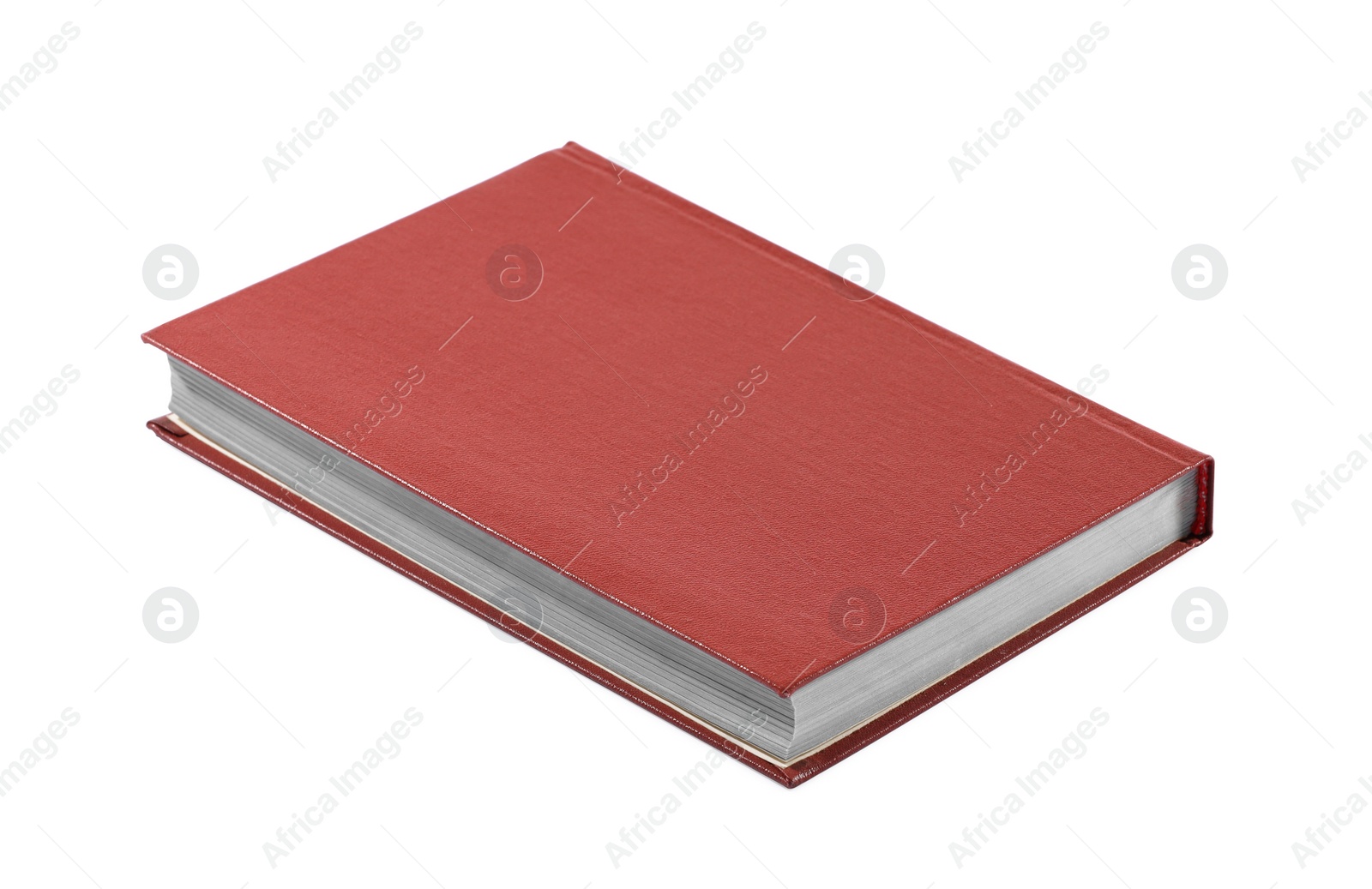 Photo of One closed red hardcover book isolated on white