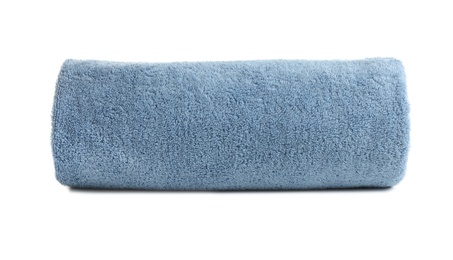 Photo of Rolled soft terry towel on white background