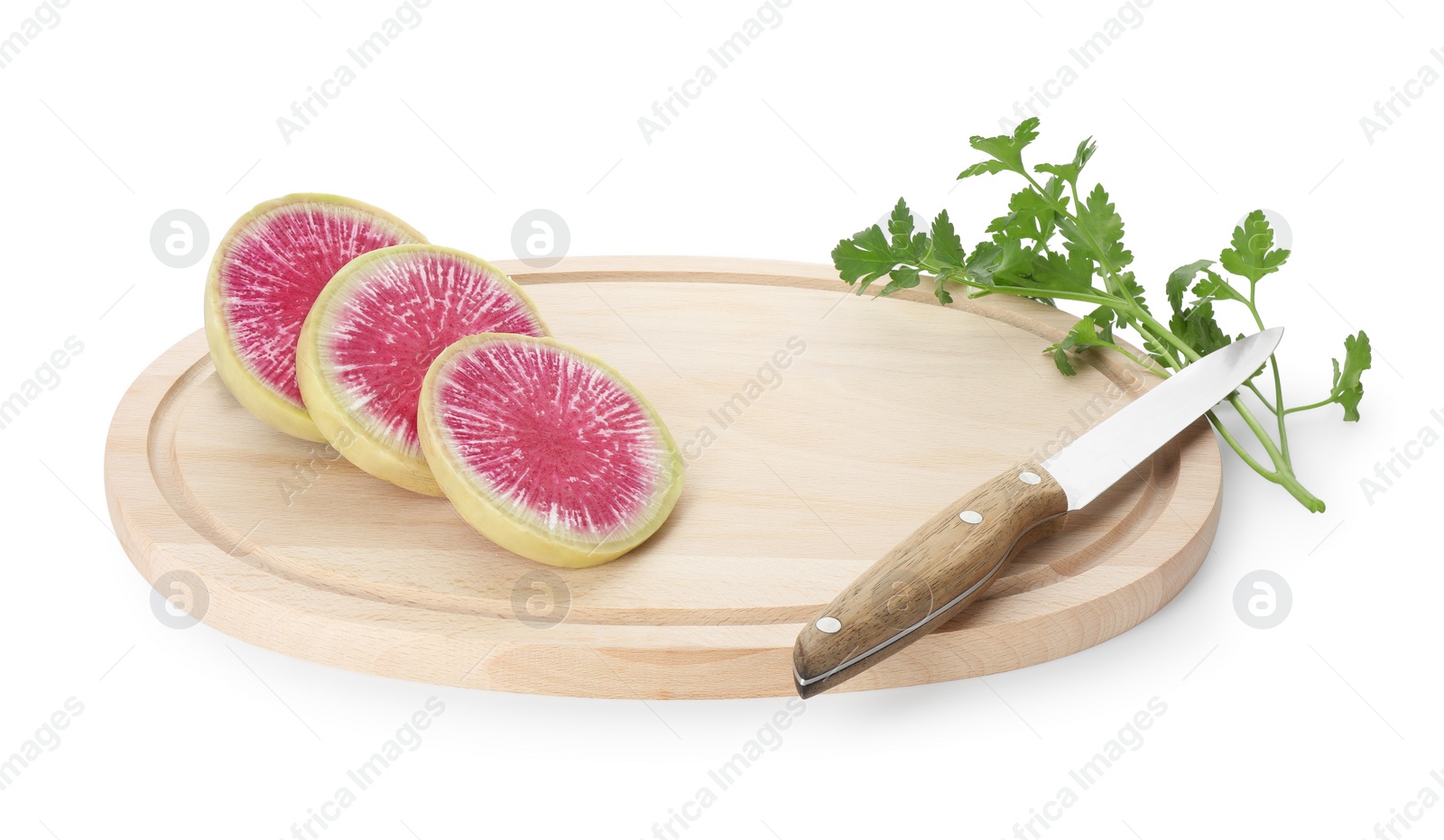Photo of Wooden cutting board with fresh red meat radish, parsley and knife isolated on white