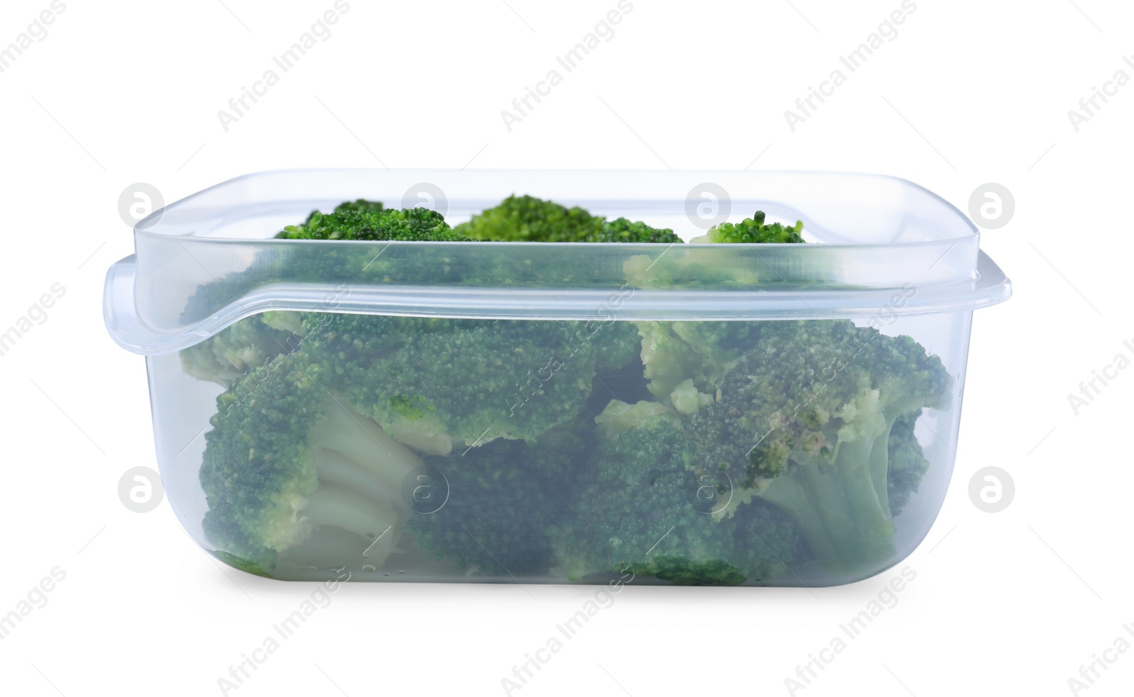 Photo of Fresh broccoli in plastic container isolated on white